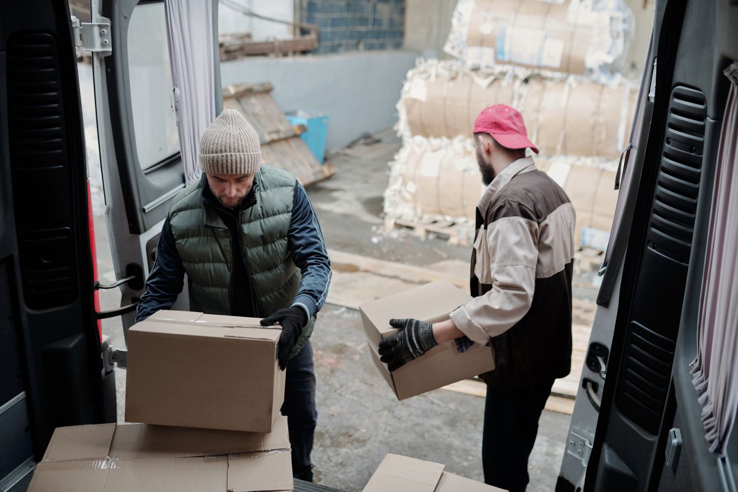men unloading boxes